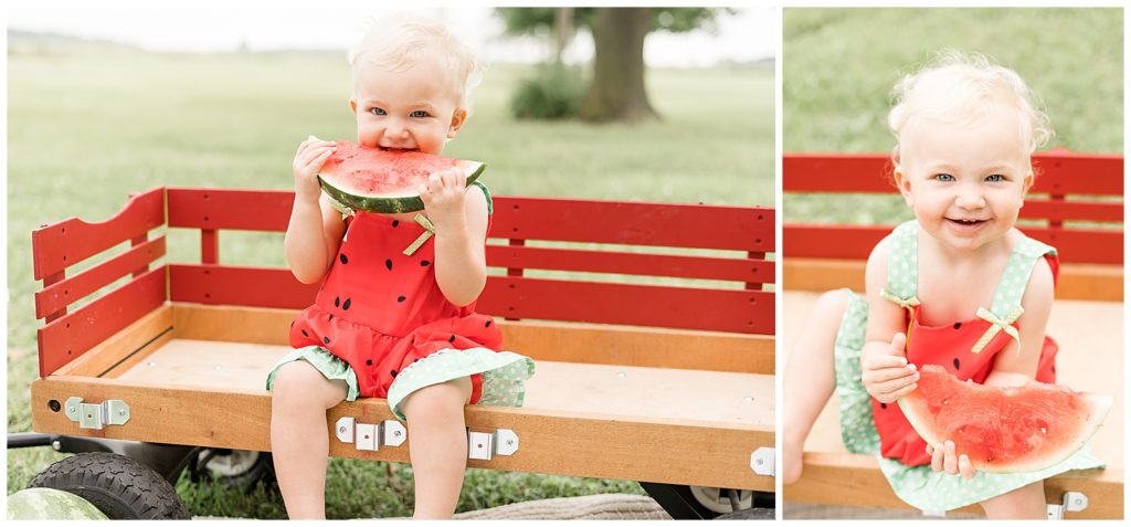 little girl smiling at camera and eating watermelon in wagon