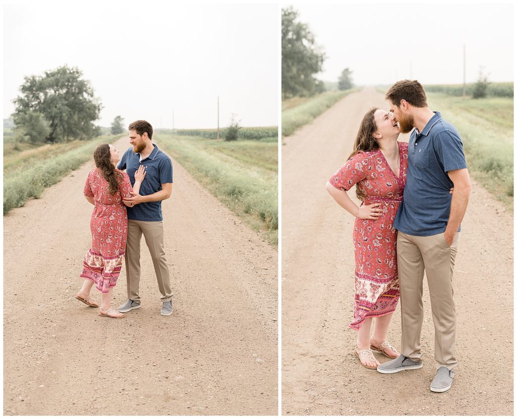 Couple sharing a kiss while standing in the road